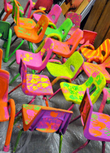 chairs painted by students in Colorado to raise funds for Head Start