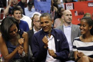 the-obamas-dance-in-their-seats-at-a-us-mens-olympic-basketball-team-game-in-july-2012