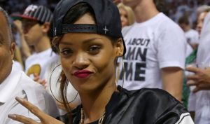 Rihanna flaunts nipple rings in see through mesh top 