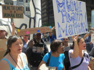 Protestors push for funding for mental health 