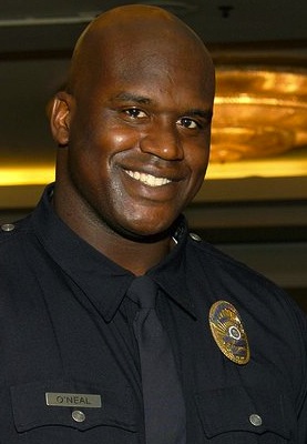 shaquille officer police neal becoming eyes sworn chief oneal became enforcement yesterday largest law even country history he if made