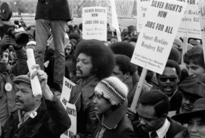 Jesse Jackson participating in a rally on January 15, 1975