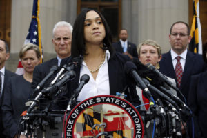 Marilyn Mosby, Baltimore state's attorney, pauses while speaking during a media availability, Friday, May 1, 2015 in Baltimore.  Mosby announced criminal charges against all six officers suspended after Freddie Gray suffered a fatal spinal injury while in police custody. (AP Photo/Alex Brandon)