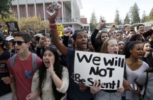 Berkeley High School students including Nancy Nguyen (left), Berenabas Lukas (middle) and Simone Ewell Szabo (right) stage a walkout demonstration at Sproul plaza over a racist post on the school website in Berkeley, Calif., on Thursday, November 5, 2015. Photo: Liz Hafalia, The Chronicle