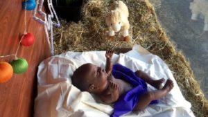 This black doll in the nativity scene on display in MP Lizzie Blandthorn's Pascoe Vale office has some locals seeing red.