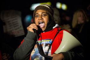 Erica Garner, daughter of Eric Garner, leads a march of people protesting the Staten Island, New York grand jury's decision not to indict a police officer involved in the chokehold death of Eric Garner in July, on Dec. 11, 2014 in the Staten Island Neighborhood of New York City. Protests have continued throughout the country since the Grand Jury's decision was announced last week. (Andrew Burton/Getty Images)