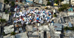 Haitians set up impromtu tent cities thorough the capital after an earthquake measuring 7 plus on the Richter scale rocked Port au Prince Haiti just before 5 pm yesterday, January 12, 2009.