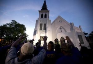 Parishioners and community supporters at the reopening of Mother Emanuel A.M.E. in Charleston, S.C. following the mass shooting that killed 9 people on June 17. 2015. Photo by Stephen B. of Morton/AP