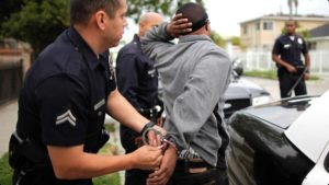 120312-national-arrest-handcuffs-police-school-to-prison-2