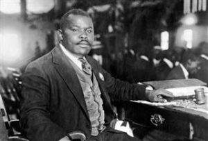 Publisher and orator Marcus Garvey seated at his desk, August 5, 1924. Underwood Archives via Getty Images