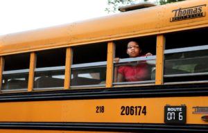 Fifth-grader Naomi Goodloe, 11, on her way to her new school in the Francis Howell School District in the St. Louis suburbs. Credit Robert Cohen/St. Louis Post Dispatch via AP