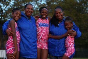 The Sheppard sisters pose with coach Jean Bell and her sister, fellow coach Karel Lancaster Sports Illustrated for Kids