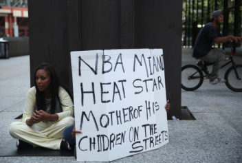 Dwyane Wade's Ex-Wife Siohvaughn Protests With Homeless Sign in Chicago