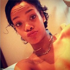 Rihanna loses gray weave for curly cut