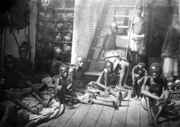 (Starved children slaves en route to the Americas)