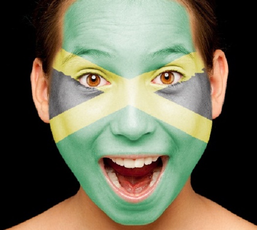 girl with jamaican flag painted on her face