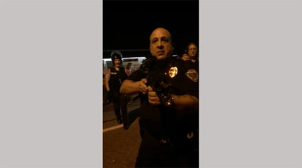 Watch This Police Officer Point His Rifle Directly at Unarmed Protesters While Threatening, â€˜I Will F***ing Kill You!â€™