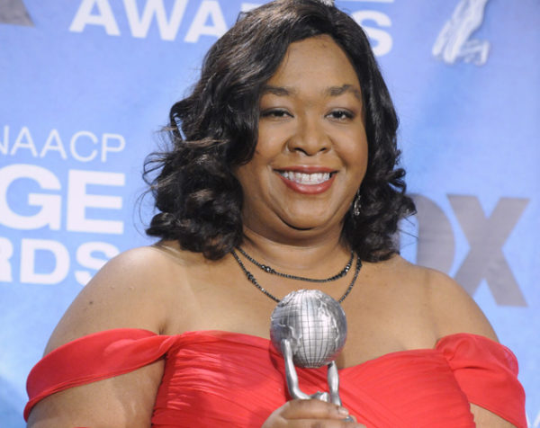 Shonda Rhimes poses backstage with her award at the 42nd NAACP Image Awards Awards in Los Angeles