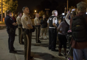 Ferguson officers arrest more protestors 