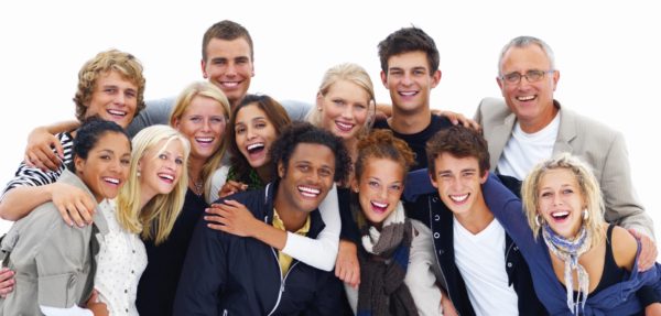 Group of smiling friends against white background