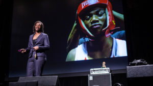 Claressa Shields speaking to youths about her life.