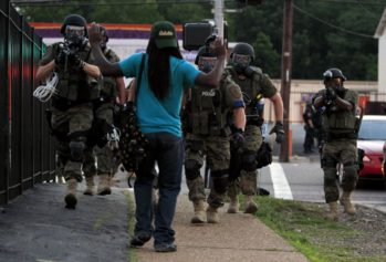 After Failing to Charge Darren Wilson, Justice Department Slams Ferguson Police Department for Discrimination and Profiling