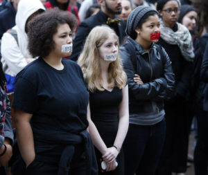 Students at the University of Oklahoma protest racist comments made by SAE fraternity members.  (AP Photo/The Oklahoman, Steve Sisney)