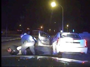 Shocking Video Appears to Show Police Planting Drugs in Car of Black Man Viciously Beaten in Michigan