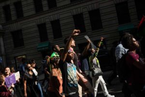 BALTIMORE, MD - MAY 02: Protesters march from City hall to the Sandtown neighborhood May 2, 2015 in Baltimore, Maryland. Freddie Gray, 25, was arrested for possessing a switch blade knife April 12 outside the Gilmor Houses housing project on Baltimore's west side. According to Gray's attorney, Gray died a week later in the hospital from a severe spinal cord injury he received while in police custody. State attorney Marilyn Mosby of Maryland announced that charges would be brought against the six police officers who arrested Gray. (Photo by Andrew Burton/Getty Images)