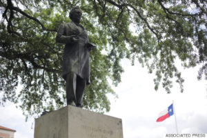 A statue of Jefferson Davis is seen on the University of Texas campus, Tuesday, May 5, 2015, in Austin, Texas. The University of Texas student government passed a resolution recently to remove the statue of Jefferson Davis from a prominent space on the university campus. (AP Photo/Eric Gay)