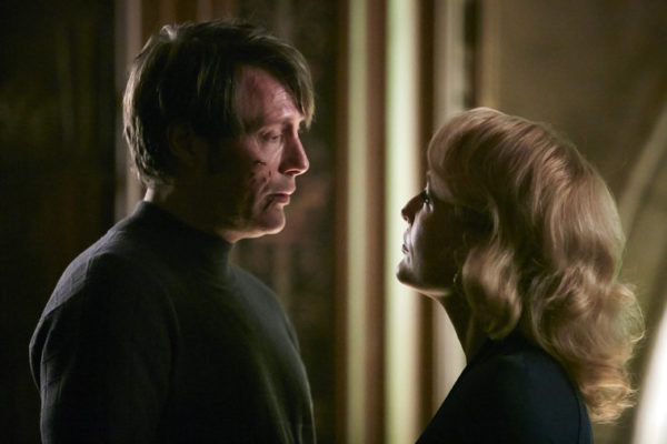 HANNIBAL -- "Dolce" Episode 306 -- Pictured: (l-r) Mads Mikkelsen as Hannibal Lecter, Gillian Anderson as Bedelia Du Maurier -- (Photo by: Ian Watson/NBC)