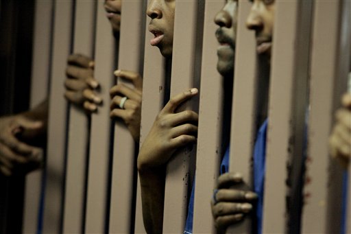 Black prisoners behind bars