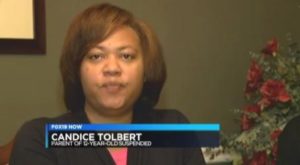 Candice Tolbert's 12-year-son was suspended for staring at a white classmate. 