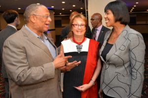 Prime Minister, the Most. Hon. Portia Simpson Miller (right); and Minister of Finance and Planning, Dr. the Hon
