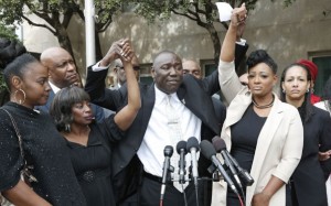 Attorney Benjamin Crump with two accusers in the Holtzclaw trial, Jannie Ligons, second from left, and Shardayreon Hill, second from right. AP