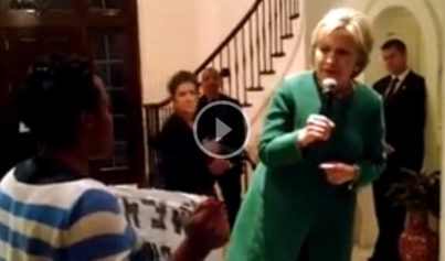 Black Lives Matter activist confronts Hillary Clinton during speech