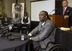 Dontrell Stephens(C), with his attorney Jack Scarola (R), at a press conference Thursday February 11, 2016 in West Palm Beach. (Bill Ingram / The Palm Beach Post)