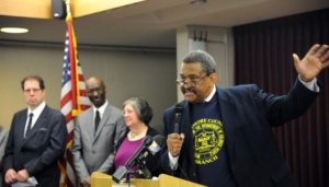 Tony Fugett, president of the Baltimore County branch of the NAACP, addresses the press conference. In the background from left are: Robert Strupp, executive director of Baltimore Neighborhoods Inc.; Victor Goode, with the national NAACP; and Susan Tannenbaum, Mistress of Ceremonies. (Baltimore Sun)
