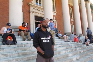 Clemson University graduate student A.D. Carson stands with other students during a sit-in protest about diversity at Sikes Hall on Monday, in Clemson, S.C. Jeffrey Collins/AP