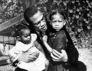 Black Muslim activist Malcolm X with his daughters Qubilah (L) and Attilah (R). (Photo by Robert L. Haggins//Time Life Pictures/Getty Images)