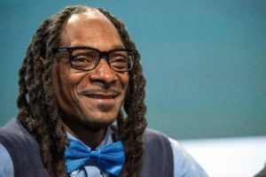Rapper Snoop Dogg smiles at the TechCrunch Disrupt SF 2015 conference in San Francisco, California, U.S., on Monday, Sept. 21, 2015. Photo by David Paul Morris/Bloomberg