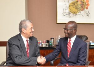 Outgoing CEO Norman Williams, left, with new chairman Paa Kwesi Nduom. Image courtesy of ChicagoBusiness.com