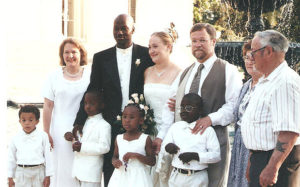 Rachel, believed to be her wedding day with husband Kevin Moore. Adopted daughter Esther, 2nd from right.