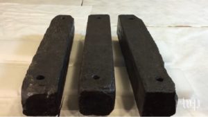 Some of the iron ballast bars that were shipped to the U.S. to be displayed at the Smithsonian National Museum of African American History and Culture. Photo courtesy of the Washington Post