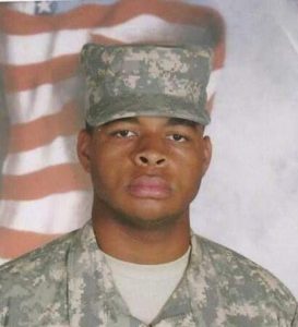 Micha Xavier Johnson was a corporal in the U.S. Army and served in Afghanistan, Heavy.com reports