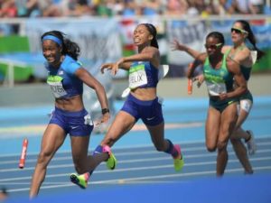 Allyson Felix drops baton during hand off to teammate (USA Today Sports)