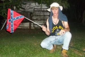 Photo of accused church shooter Dylann Roof posing with a Confederate flag. Photo courtesy of ChristianPost.com