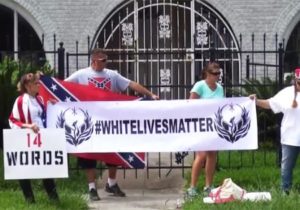 White Lives Matter protester demonstrating outside the Houston NAACP headquarters.