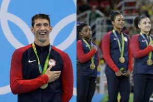 Michael Phelps laughs on Olympic podium during U.S. national anthem, Simone Biles stands beside Gabby Douglas and Laurie Hernandez during anthem (AP) 