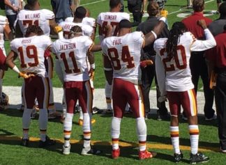After Redskins Coach Said They Wouldn't, Four Players Defiantly Raise Fists in Protest of Anthem